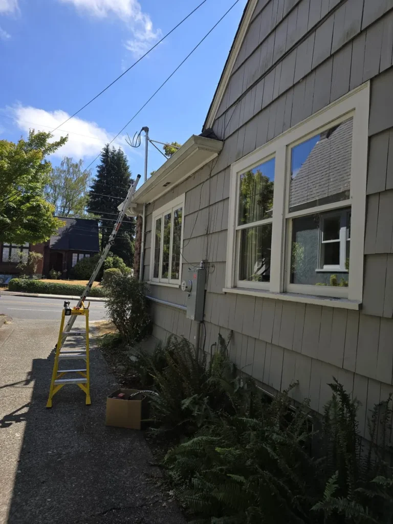 Electrical Mast Repair in Seattle, WA 98105: A Passing Semi Truck Tore Down a Ravenna Rental Home's Power Line